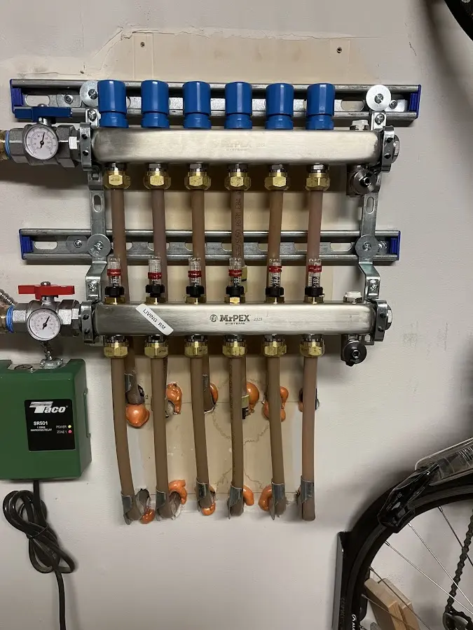 Plumber performing Sink Repair at a residential property in Bedford