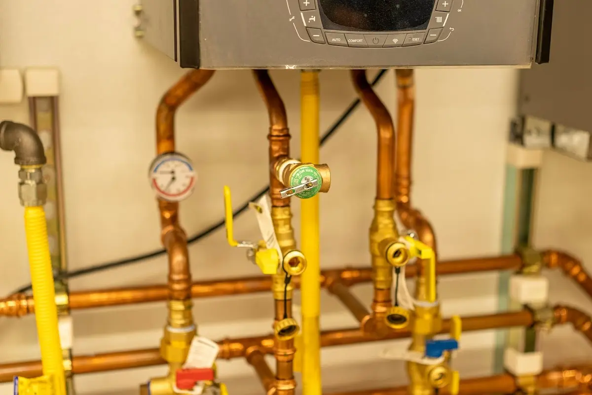 Licensed technician providing Backflow Prevention for a homeowner in Bedford